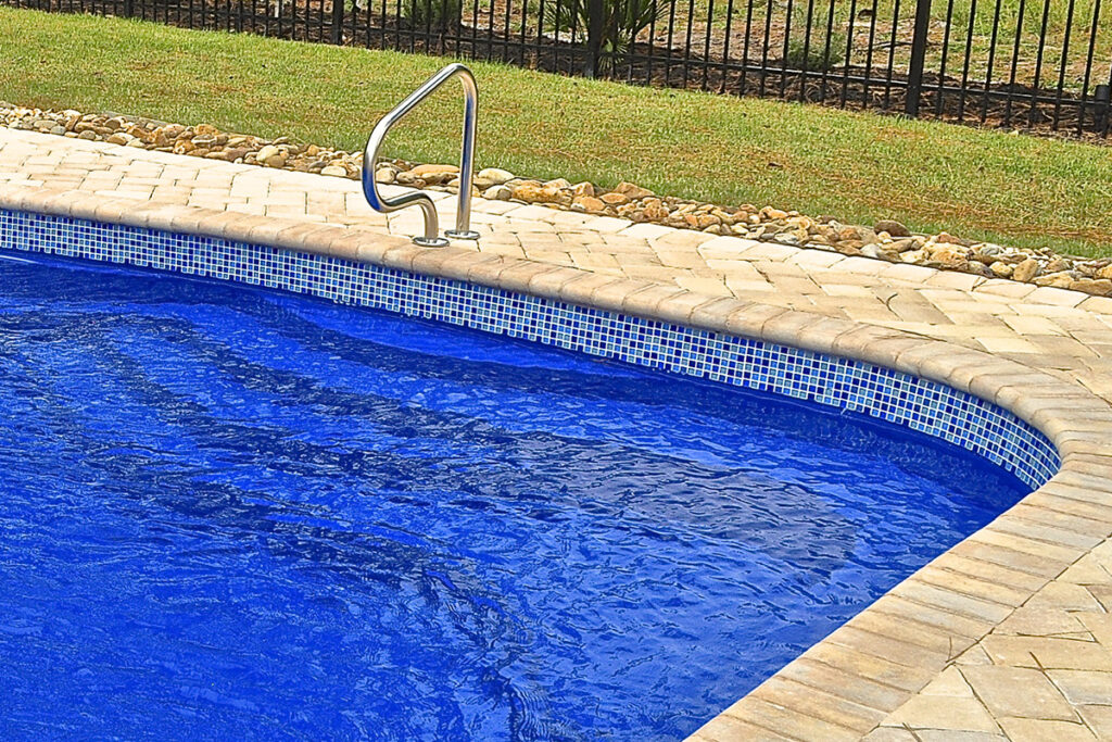 waterline tile on a pool perimeter